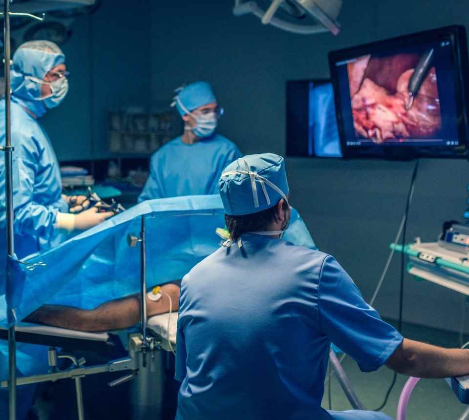 Interventional radiologist in Abbottabad collaborating with a general surgeon to plan a patient’s treatment