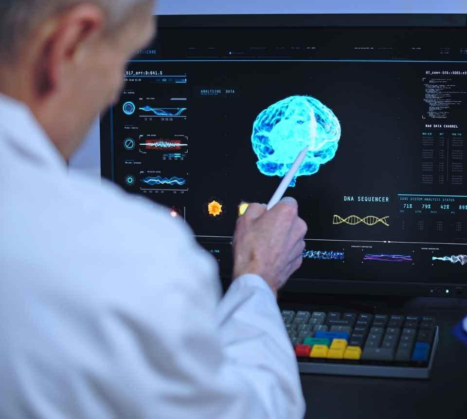 Interventional radiologist in Abbottabad collaborating with a neurologist to treat brain or spinal conditions