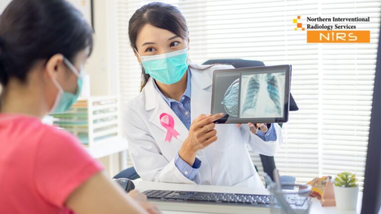 This detailed image depicts a professional interventional radiologist performing aTop Breast Tumor Marker Clip Placement at NIRS Peshawar. The procedure involves ultrasound-guided deployment of a biocompatible marker into the breast tissue to ensure accurate surgical and therapeutic localization. The setup highlights a sterile environment, advanced imaging monitors, and patient-centered care, representing NIRS’s excellence in precision and safety.